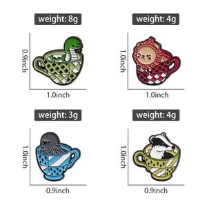 Set of four magical animal teacup pins featuring lion snake bird and badger designs