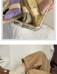 Close-up of vintage wool socks showing thick knit texture and various warm colors
