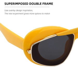 Detail of modern yellow cat-eye sunglasses featuring a unique double frame layered design