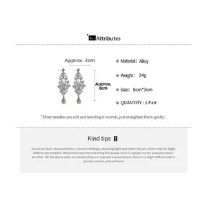 Detail of elegant silver needle rhinestone tassel earrings showing 8cm length and 24g weight