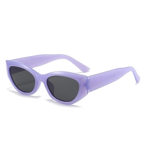 Retro purple translucent cat-eye sunglasses with dark grey UV protective lenses