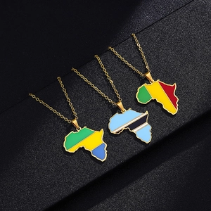 Detailed close-up of African map pendants with vibrant flag colors on gold chains