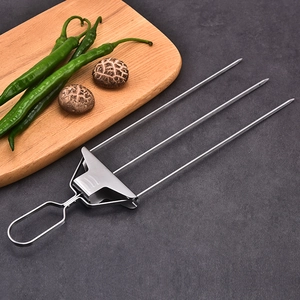 Three-prong stainless steel BBQ skewers with semi-automatic slider on a grey background