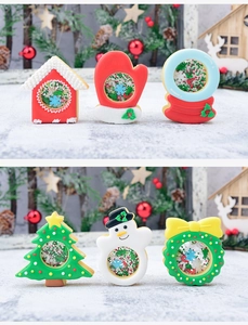 Detail of Christmas shaker cookies with icing and glitter windows in festive shapes