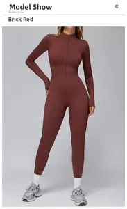 Detail of slim-fit brick red thermal yoga jumpsuit with front zipper and stand collar