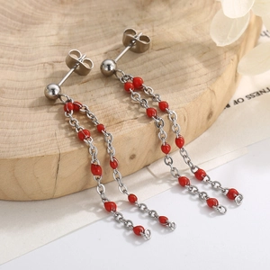 Long tassel drop earrings with red resin beads and stainless steel chains in silver finish