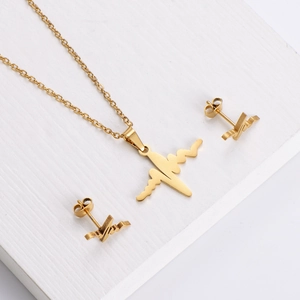 Golden heartbeat jewelry set featuring ECG pattern necklace and stud earrings