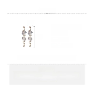 Detail view of long resin flower tassel earrings with size dimensions and specifications