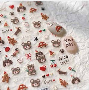 Macro shot of cute cartoon nail art stickers with bears, cherries and happy slogans