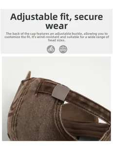 Detail of adjustable metal buckle and washed canvas texture on vintage baseball cap
