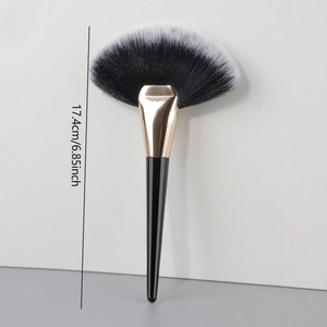 Large fan-shaped makeup brush with black and white gradient bristles and a 17.4cm black handle