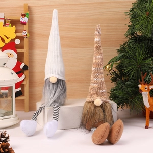 Charming faceless Christmas gnomes with knit hats and long fur beards for holiday decor
