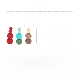 Detailed view of irregular geometric tiered drop earrings with size and iron material specs