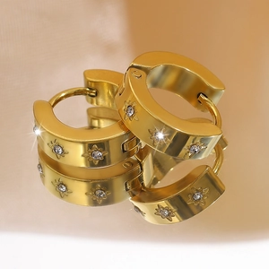 Luxurious gold-plated titanium steel hoop earrings with sparkling eight-pointed star crystals