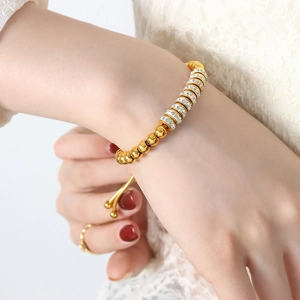 Bracelet en acier titane doré avec perles élégantes et zircons blancs étincelants