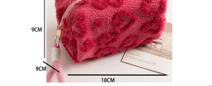 Detail showing the 18x9x9cm dimensions of the leopard pattern plush makeup bag