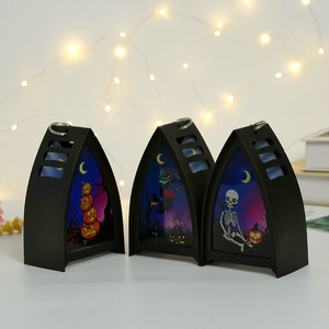 Set di tre lanterne LED decorative per Halloween con illustrazioni di zucca e strega.