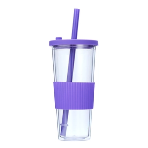 Clear double wall plastic tumbler with purple lid straw and silicone sleeve detail shot