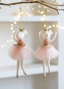 Close-up detail of cute felt mouse ballerina ornament with pink tutu and gold crown.