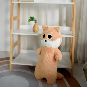 Macro detail of a long Shiba Inu plush toy skin with orange fur and big round eyes