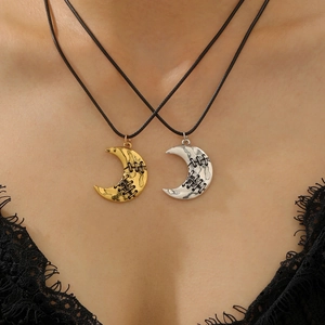 Gothic moon pendant necklace set in gold and silver finish with stitched texture design