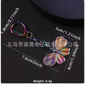 Detailed view of Y2K rainbow gradient butterfly keychain showing specific measurements
