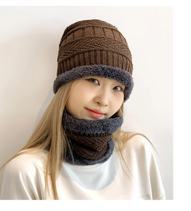 Close-up of winter knit hat and neck warmer set with thick grey fleece lining