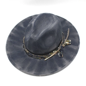 Distressed charcoal wool felt fedora with ethnic floral ribbon and feather detail