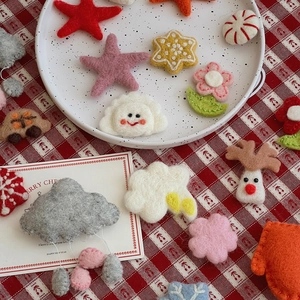 Christmas wool felt charms featuring stars and deer for DIY holiday floral arrangements