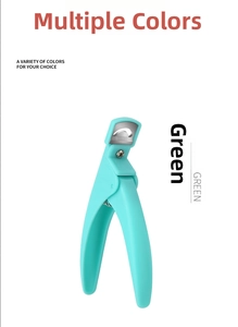 Detail view of the mint green U-shaped nail tip clipper with stainless steel blade