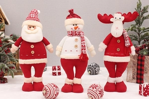 Detailed close-up of knitted Santa, Snowman, and Reindeer plush Christmas ornaments