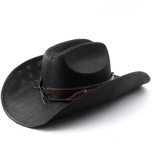 Detailed close-up of a black woven cowboy hat featuring a brown leather decorative band