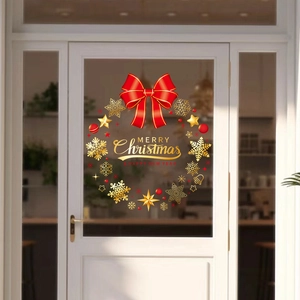 Merry Christmas and Happy New Year window stickers with red bow and gold snowflakes