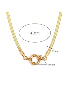 Detailed view of 18k gold snake chain with measurements: 40cm length and 3.2mm width