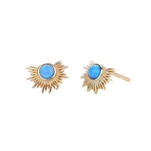 Macro detail of S925 sterling silver sunburst earrings with blue opal in gold finish