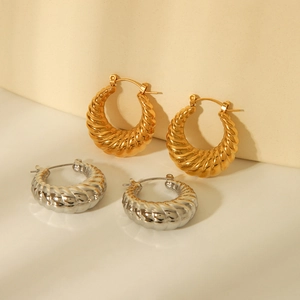 18K gold and silver hollow croissant hoop earrings in twisted stainless steel texture