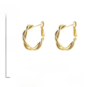 Detailed view of gold twisted hoop earrings showing S925 silver needle and 2.6cm dimensions