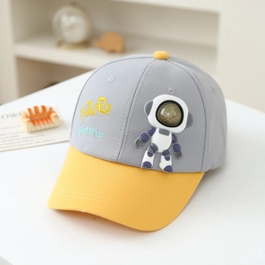 Detail of child's baseball cap with 3D astronaut patch and Future Partner embroidery