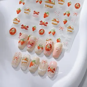 Detailed 5D strawberry nail art stickers with bow and pearl embossed patterns