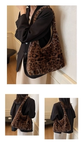 Detail of large leopard print faux fur hobo bag with soft plush texture for winter