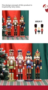 Detail of wooden nutcracker soldier figurines with festive red and green holiday decor