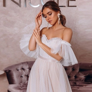 Elegant white polka dot mesh wedding dress with off-shoulder layered ruffle sleeves