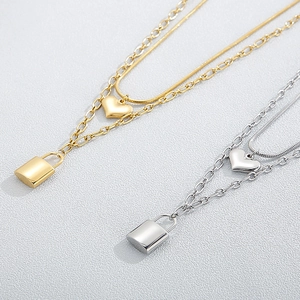 Double layer stainless steel heart and lock pendant necklace in gold and silver finish
