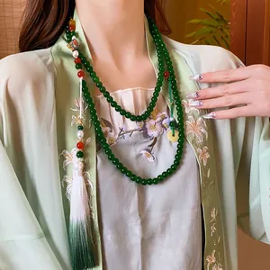 New Chinese beaded necklace with green agate-style beads and a white gradient tassel