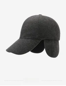 Detail view of charcoal wool baseball cap with ear flaps and PARD embroidery