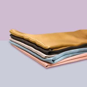 Glossy 22 momme mulberry silk pillowcase stack in five elegant colors with soft luster