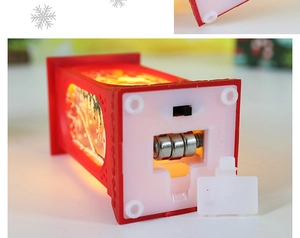 Detail of the bottom battery compartment with ON/OFF switch for the Christmas lantern