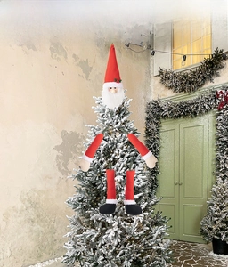 Creative Santa tree hugger set with plush head, arms, and legs for festive tree decor