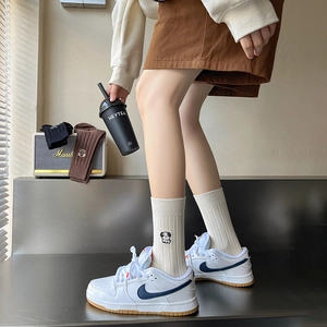 Japanese style embroidered dog crew socks in beige, brown and black ribbed cotton