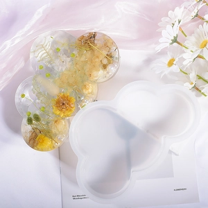 Cloud shaped silicone mold for resin diy crafts featuring dried flowers and gold foil